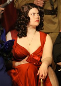 Caroline Edwards as Miss Scarlett